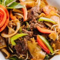 Drunken Noodles (Pad Kee Mow) · Stir fried flat rice noodles, eggs, bell peppers, fresh chili, onions, tomatoes, bean sprout...