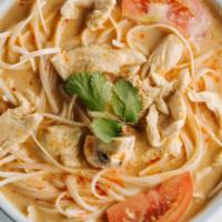 Tom-Kha Noodle Soup · Rice noodles with mushrooms and tomatoes in coconut soup.