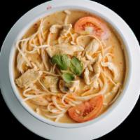 Tom-Yum Noodle Soup · Rice noodles with mushrooms and tomatoes in lemon grass broth.