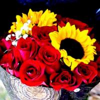 Luxury  Red Roses  Bouquet · included red roses and 2 sunflwer black paper
VIP delivey same day