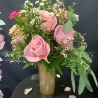 Deluxe Love Ocation · elegant bouquet   of love ocation 
Includes a dozen roses. baby breath eucalyptus and an ele...