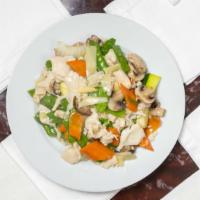 Moo Goo Gai Pan · Sauteed white meat chicken, mushroom, napa, snow peas, bamboo, water chestnut, and carrot wi...
