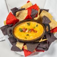 Sausage Queso · served with tortilla chips