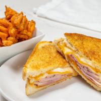 Grilled Ham & Cheese · Gruyere, smoked cheddar, Swiss cheese and ham on sourdough bread with dijon spread