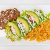 Flautas De Pollo · Crispy rolled tortilla filled with shredded chicken , beans and rice