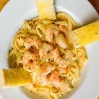 Cajun Shrimp Pasta · Large shrimp tossed in fettuccine pasta in spicy Alfredo sauce.