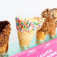 Dipped Waffle Bowl · CHOOSE FROM:
DARK CHOCOLATE, WHITE CHOCOLATE, BUTTERFINGER, HEATH, WHITE CHOCOLATE SPRINKLE,...