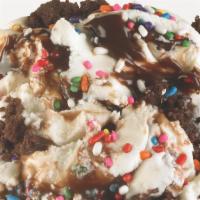 Better Batter Boogie Board Ice Cream · Birthday cake ice cream, rainbow sprinkles, brownies, and fudge.