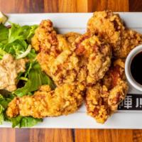 Crispy Chicken (5) · juicy fried chicken thigh with an original garlic pepper served with mixed baby greens and J...