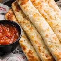 Cheesy Breadsticks  · Breadsticks coated with garlic butter and topped with mozzarella  cheese served with a side ...