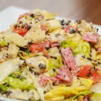 Chopped Salad · Diced Salami, Provolone, Black and Green Olives, Tomatoes, Artichoke Hearts Tossed with Lett...