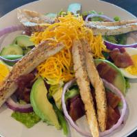 Chicken & Avocado Salad · Chef's favorite. Romaine, iceberg, spinach, grilled or crispy chicken breast strips, bacon, ...