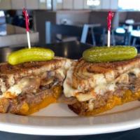 Patty Melt Grilled Cheese · 1/2lb Angus ground beef patty, caramelized onions, mushrooms, Swiss & cheddar, grilled rye &...