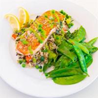 Paleo Seared Salmon Gf · seared sustainably sourced salmon topped with spring pea sauce; served over rice pilaf & top...