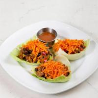 Turkey Lettuce Wraps [Gf][Df] · three baby iceberg lettuce wraps filled with all-natural ground turkey, black beans, corn, y...