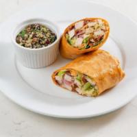 Chicken Caesar Wrap · sliced all-natural grilled chicken, romaine lettuce, caramelized red onions, sun-dried tomat...