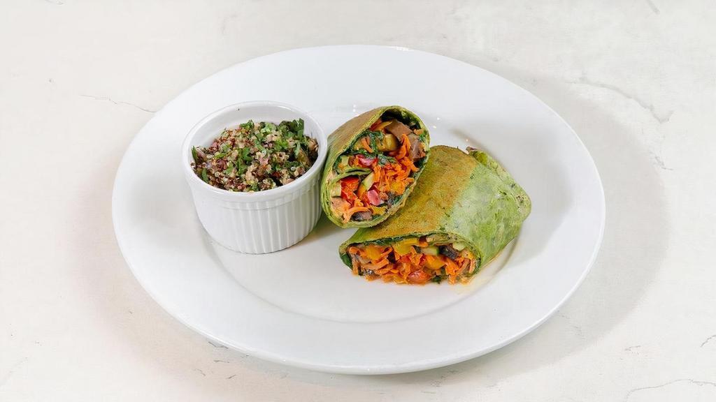 Veggie Wrap [Df] [Veg] · house-made organic chickpea hummus, sautéed cremini mushrooms, red & yellow peppers, fresh spinach, zucchini & sliced carrots wrapped in a spinach tortilla