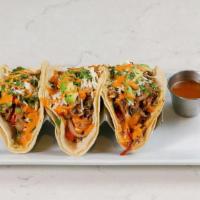 (3) Hand Pulled Chicken Tacos [Gf] · roasted all-natural zaatar-crusted chicken topped with sautéed red onions, yellow & red pepp...