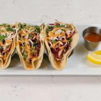 (3) Spicy Fish Tacos [Gf] · your choice of grilled or fried basa, green & red cabbage, pico de gallo, cilantro, roasted ...