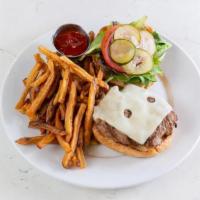 The (T) Burger · all-natural ground turkey*, honey dijon mustard, mixed greens, tomato, house-made pickles, r...