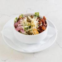 House Caesar Salad · tossed in creamy chipotle caesar dressing