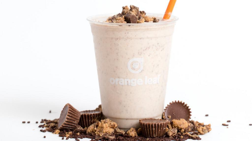 Peanut Butter Cup Shake · Orange leaf vanilla yogurt blended with Reese’s® peanut butter pieces creating a smooth peanut butter cup shake.