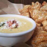 Traditional Queso · Smooth melted 