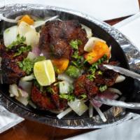 Lamb Boti · Gluten-free. Cubes of lamb marinated in special blend of spices and lemon juice.
