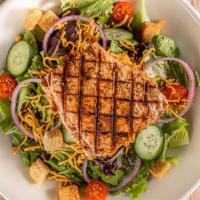 Garden Salad With Salmon · $12.29 Sm / $ 17.59 Lg. Tomatoes, red onions, cucumbers, croutons, . cheddar cheese and salm...