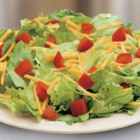 Garden Salad · Seasonal greens topped with diced tomatoes, shredded cheddar cheese, and choice of dressing....