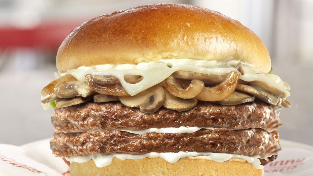 Route 66 Double · Swiss cheese, grilled mushrooms, caramelized onions, and mayonnaise. 1060 cal.
