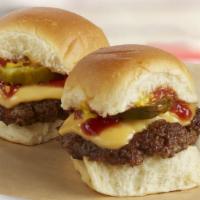 Mini Burgers · Two mini-burgers with choice of ketchup, mustard, and pickle. 660-900 cal.