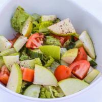 Seasonal Salad · Romaine lettuce, chopped tomatoes, cucumbers, fresh apple, olive oil, lemon and pomegranate ...