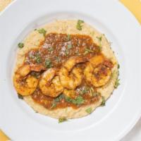 Mexi-Shrimp N Grits · Grilled Seasoned Shrimp over  Poblano Cheese Grits and Chorizo Gravy.