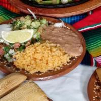 3 Piece Flour Tacos Plate · Served with rice, beans, onions and cilantro on choice of meat.