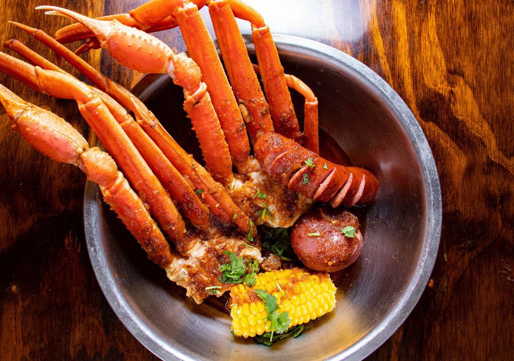 Snow Crabs (1.5-2 Clusters) · Our most ordered Crab variant! They come in clusters for you to crack open and devour! Sweet meat naturally combined with our Garlic Butter, House Cajun Rub or Hot & Sour sauces make for some of the best eating!