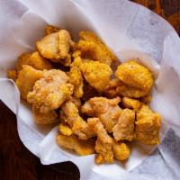 Chicken Bites · Tender dark meat chicken cutlets, lightly dusted in potato starch and deep fried to golden p...