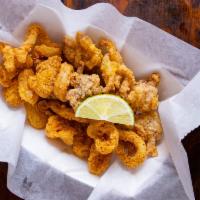 Calamari · Perfectly fried lightly battered calamari tossed ever so delicately in one of our signature ...