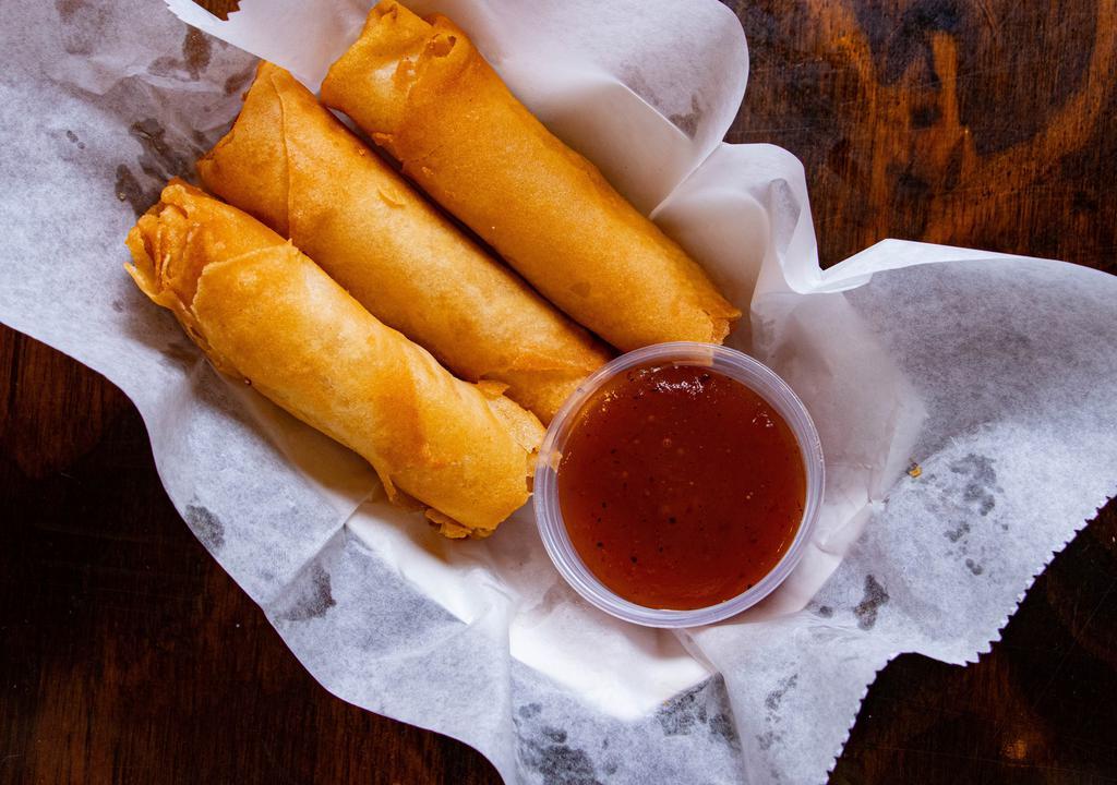Cheesy Crawfish Rolls (3 Ct) · Crawfish tails, a 3-cheese blend, and grated jalapenos hugged inside a golden fried egg roll wrapper. Be careful its hot but you'll definitely won't want to share!