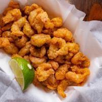 Crawfish Tails · Perfectly fried hand peeled crawfish tails tossed ever so delicately in one of our signature...