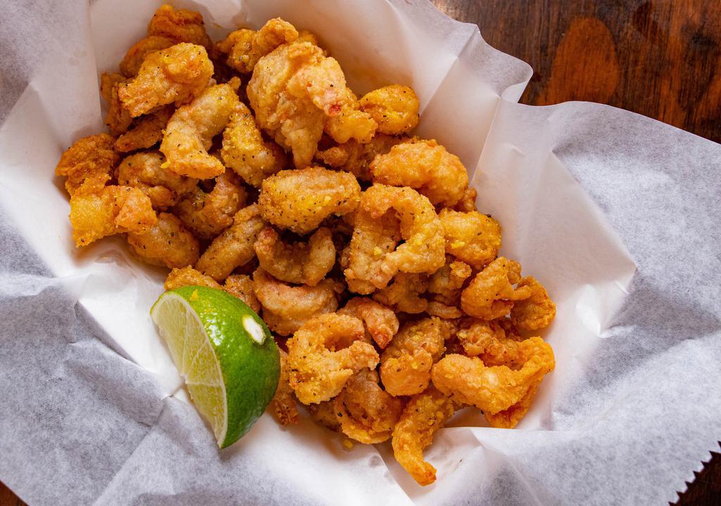 Crawfish Tails · Perfectly fried hand peeled crawfish tails tossed ever so delicately in one of our signature dry rubs or sauces!
