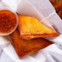 Crawfish Empanadas (2 Ct) · Everyone orders these here! Stuffed with a mix of hand peeled Crawfish tails, Mirepoix, our ...