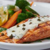 Grilled Salmon · Grilled and served with a dill cream sauce.
