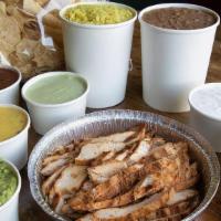 Chicken Fajita Family Meal · Fajitas served with your choice of beans, Spanish rice, guacamole, pico, sour cream, red & g...