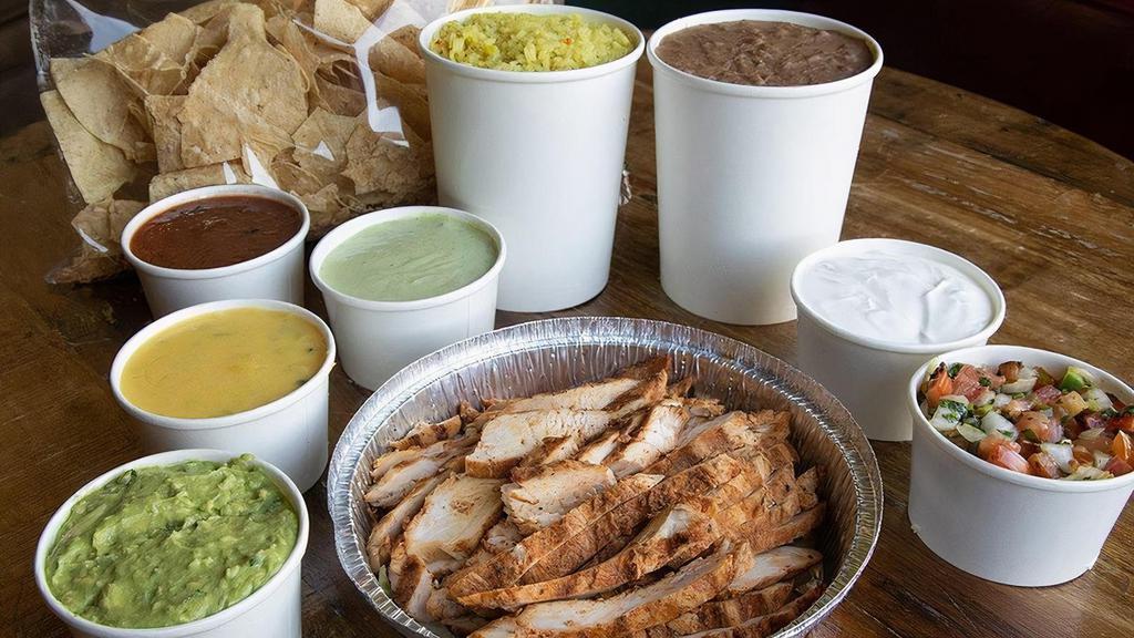 Chicken Fajita Family Meal · Fajitas served with your choice of beans, Spanish rice, guacamole, pico, sour cream, red & green salsa, queso and chips.
