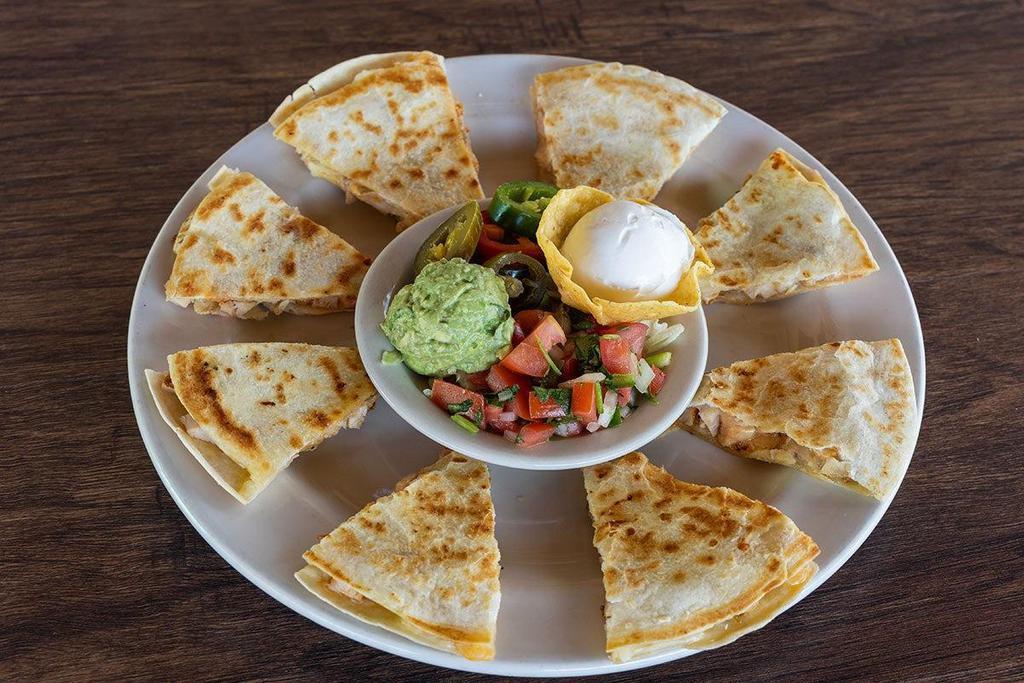 Quesadillas · Your choice of Protein, served with guacamole, sour cream, pico de gallo and jalapenos.