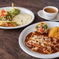 Jimmy'S Deluxe · Cheese enchilada, pork tamale, crispy beef taco, bean tostada, queso chip and guacamole.