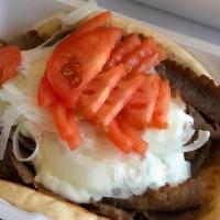 Gyro Plate With Fries
 · Equal amount of meat as 2 gyro sandwiches, 2 pita bread, Extra tomato and Onion, and 2 tzatz...