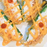 Heart Attack  · Lightly battered, jalapenos stuffed with creamcheese, crabmeat, spicy tuna top with eel sauc...