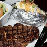 T-Bone Steak Dinner · 16 oz. steak grilled to perfection, served with house salad and loaded baked potato.